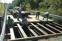 workers on bridge
